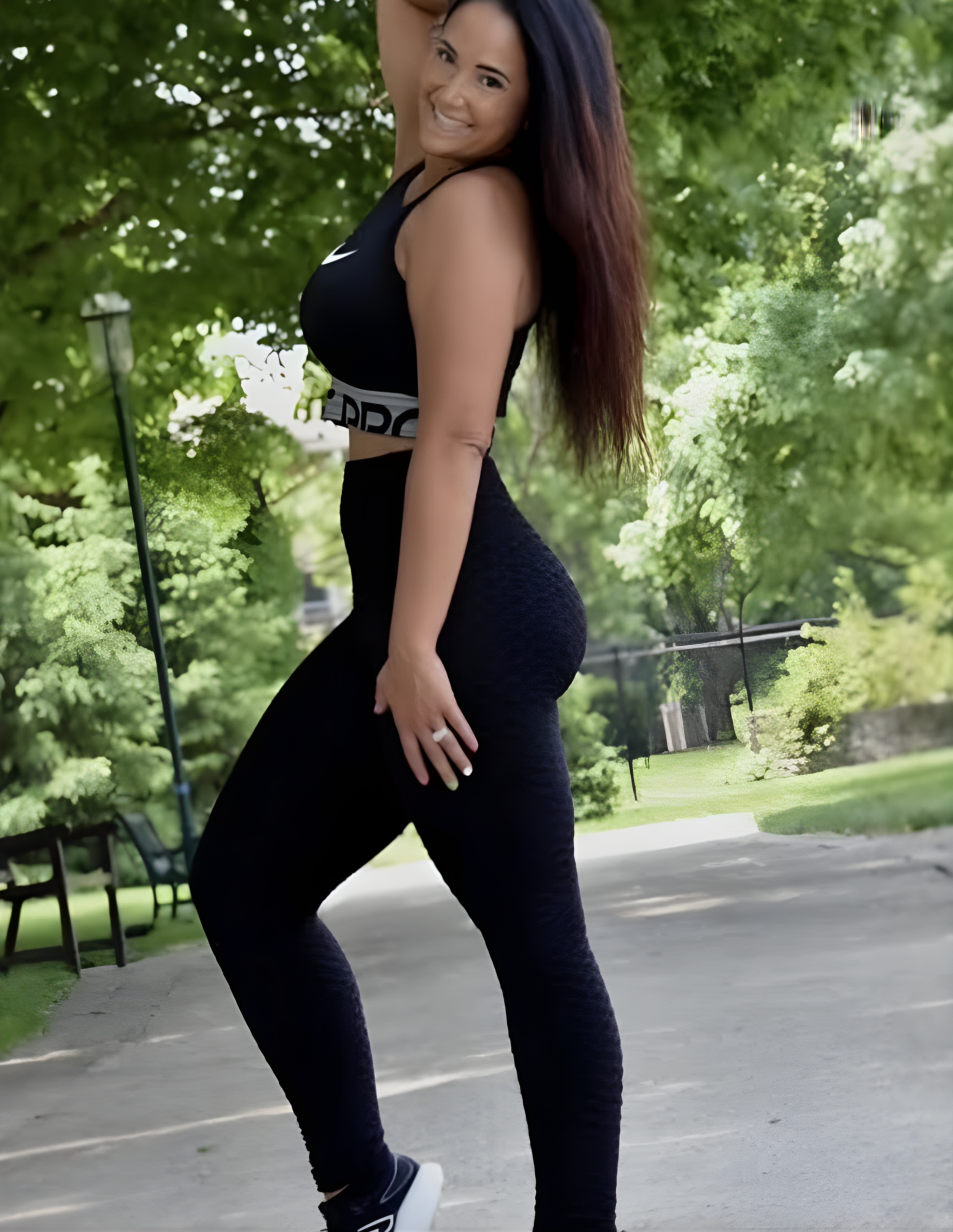 Audra Miller outside in fitness coaching setting